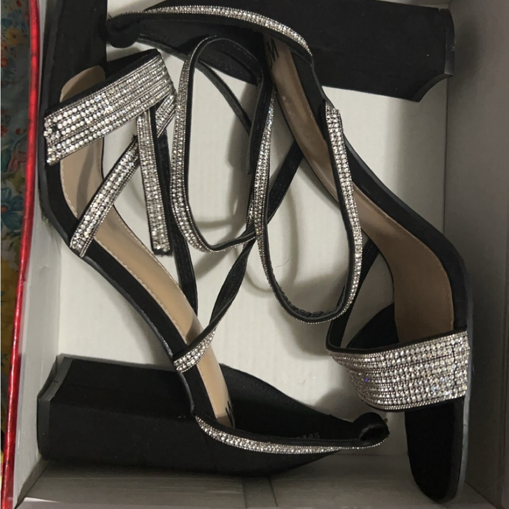 Silver and black heels